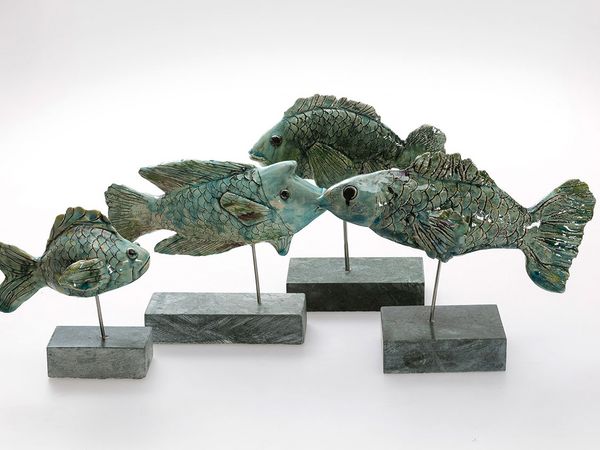 Vier Fische aus Keramik