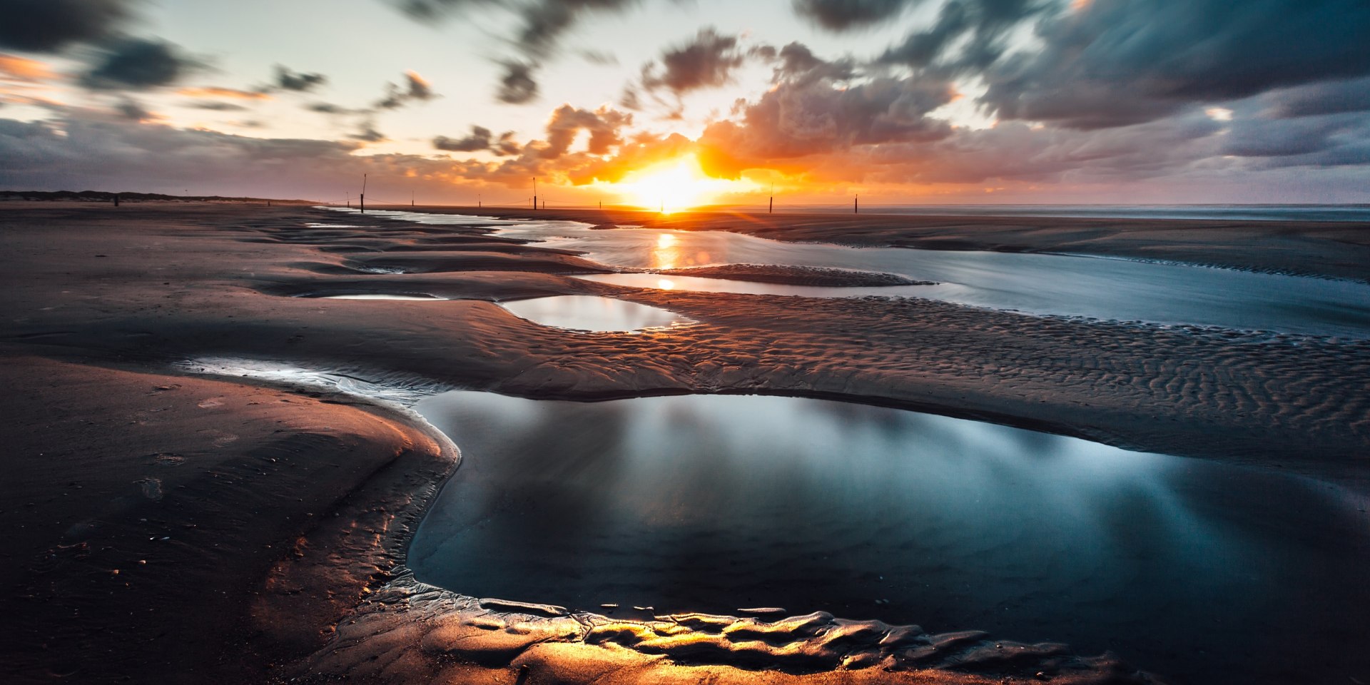 Sonnenuntergang im Wattenmeer vor Norderney , © TMN/ Janis Meyer