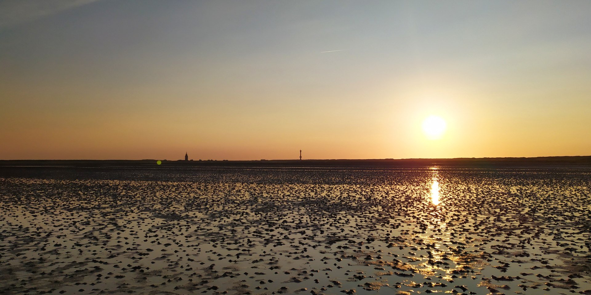 Sonnenuntergang im Watt vor Wangerooge, © Kurverwaltung Wangerooge